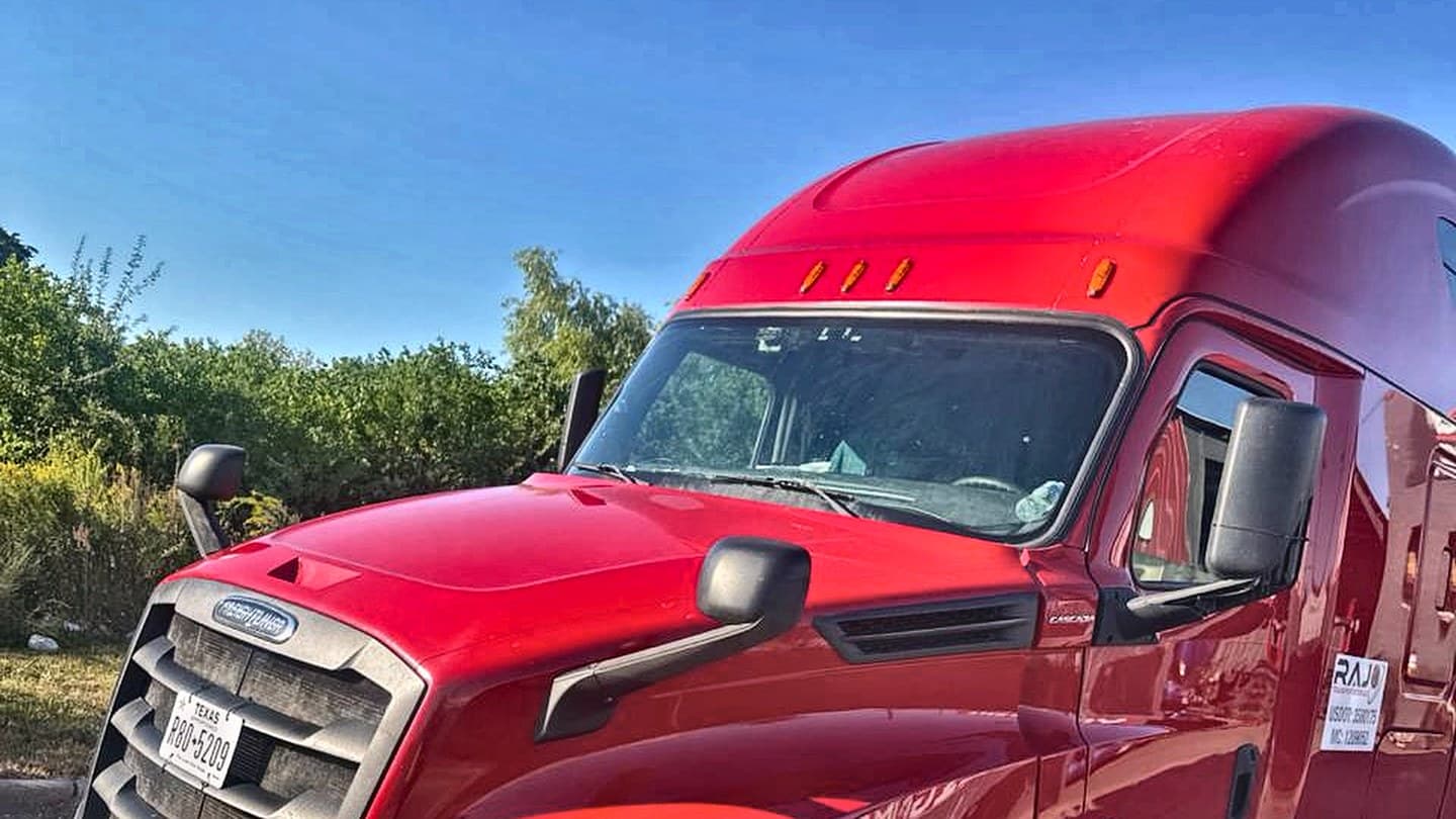 RAJO unit 575, a red Freightliner, ready for dispatch